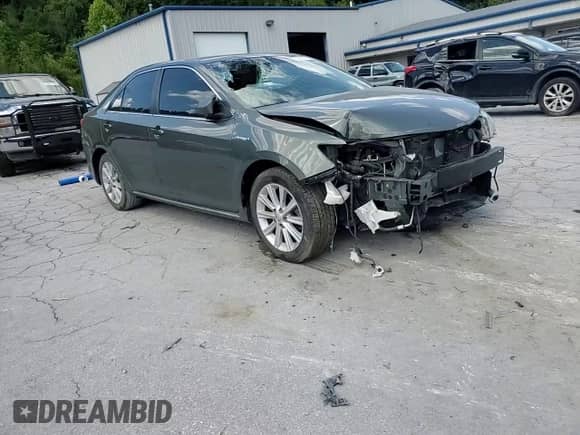 2014 Toyota Camry LE with VIN 4T1BD1FK6EU097986, listed as a Copart auction lot 70822595 with 159,238 mi miles and Salvage title. Bid and sale history available at DreamBid. Image 13.