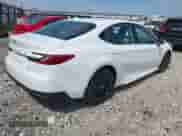 2025 Toyota Camry SE with VIN 4T1DAACKXSU083204, listed as a IAAI auction lot 43116221 with 859 mi miles and . Bid and sale history available at DreamBid. Image 4.