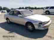 1995 Toyota Camry z VIN 4T1GK12C9SU097485, wystawiony jako Copart lot #61669585 z przebiegiem 199 965 mil mil oraz Szkoda całkowita • Salvage title. Historia ofert i sprzedaży dostępna na DreamBid. Obrazek 4.