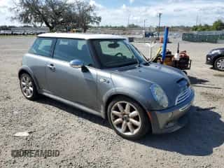 2006 MINI Hardtop S with VIN WMWRE335X6TJ40269, listed as a Copart auction lot 62719735 with 96,215 mi miles and Salvage title. Bid and sale history available at DreamBid. Image 4.