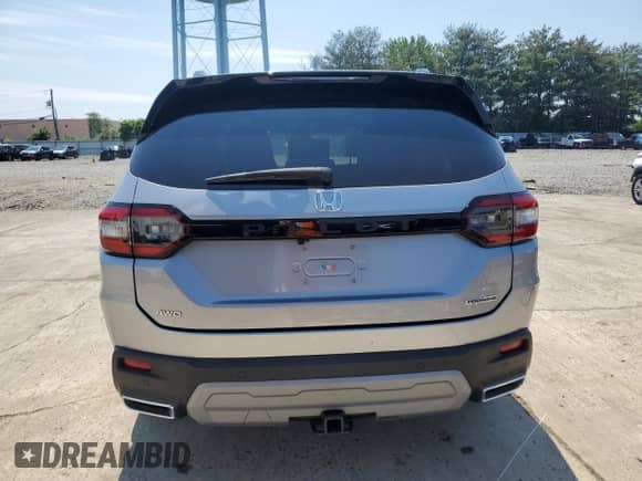 2023 Honda Pilot Touring with VIN 5FNYG1H71PB007444, listed as a Copart auction lot 63273265 with 28,199 mi miles and Salvage title. Bid and sale history available at DreamBid. Image 6.