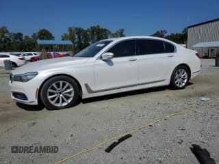 2017 BMW 7 Series 740i with VIN WBA7E2C5XHG739931, listed as a Copart auction lot 81453395 with 121,438 mi miles and Clean title. Bid and sale history available at DreamBid. Image 1.