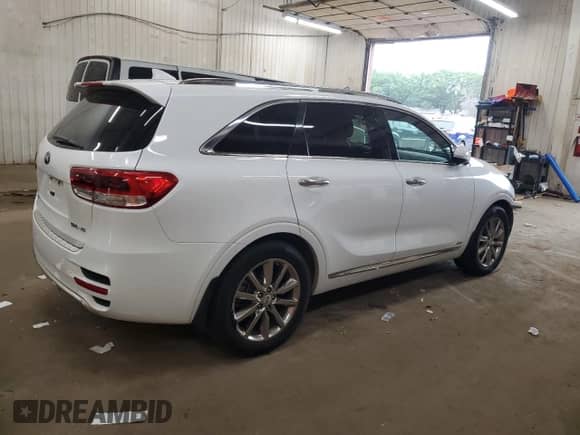 2016 Kia Sorento SXL z VIN 5XYPKDA50GG086151, wystawiony jako Copart lot #71834295 z przebiegiem 165 638 mil mil oraz Szkoda całkowita • Salvage title. Historia ofert i sprzedaży dostępna na DreamBid. Obrazek 3.