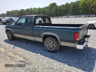 1995 Dodge Dakota z VIN 1B7GL23Y9SS177365, wystawiony jako Copart lot #68956734 z przebiegiem 210 499 mil mil oraz Szkoda całkowita • Salvage title. Historia ofert i sprzedaży dostępna na DreamBid. Obrazek 2.