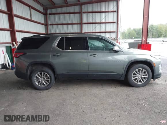 2022 Chevrolet Traverse LT Cloth z VIN 1GNEVGKW5NJ133220, wystawiony jako IAAI lot #42224191 z przebiegiem 97 309 mil mil oraz . Historia ofert i sprzedaży dostępna na DreamBid. Obrazek 13.