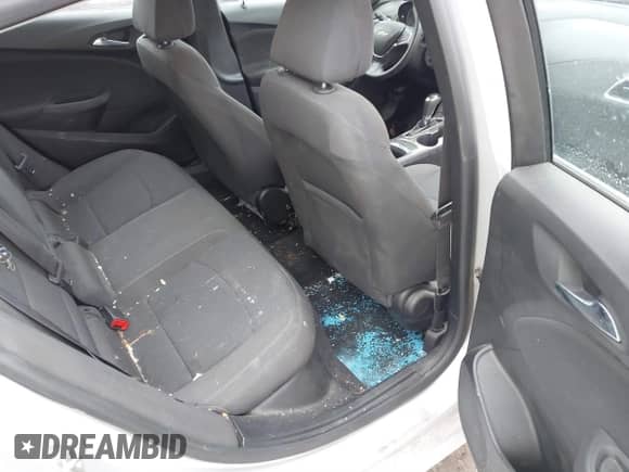 2017 Chevrolet Cruze LT z VIN 3G1BE6SM9HS609257, wystawiony jako IAAI lot #41314653 z przebiegiem 140 627 mil mil oraz . Historia ofert i sprzedaży dostępna na DreamBid. Obrazek 8.