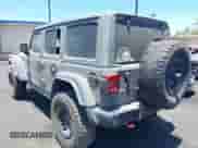 2023 Jeep Wrangler Rubicon with VIN 1C4JJXFG7PW541813, listed as a IAAI auction lot 42640045 with 53,645 mi miles and . Bid and sale history available at DreamBid. Image 3.