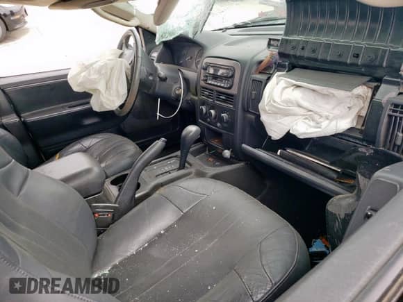 2003 Jeep Grand Cherokee Laredo with VIN 1J4GX48S63C525553, listed as a Copart auction lot 55179895 with 202,553 mi miles and Salvage title. Bid and sale history available at DreamBid. Image 8.