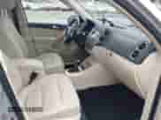 2011 Volkswagen Tiguan S with VIN WVGBV7AX0BW514599, listed as a IAAI auction lot 43051133 with 124,921 mi miles and . Bid and sale history available at DreamBid. Image 5.