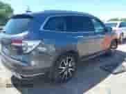 2020 Honda Pilot Touring 7-Passenger z VIN 5FNYF5H69LB015626, wystawiony jako IAAI lot #42319992 z przebiegiem 134 084 mil mil oraz . Historia ofert i sprzedaży dostępna na DreamBid. Obrazek 4.