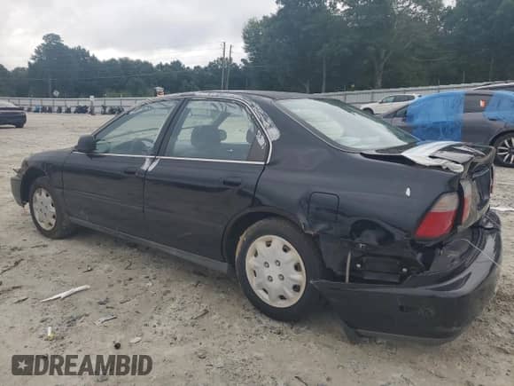 1997 Honda Accord LX with VIN 1HGCD5635VA031800, listed as a Copart auction lot 68043535 with 117,049 mi miles and Salvage title. Bid and sale history available at DreamBid. Image 2.