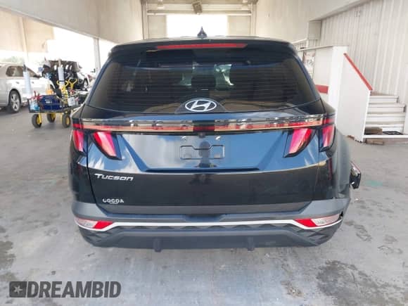 2022 Hyundai Tucson SE z VIN 5NMJA3AE1NH004787, wystawiony jako IAAI lot #43394874 z przebiegiem Nie podano mil oraz . Historia ofert i sprzedaży dostępna na DreamBid. Obrazek 16.