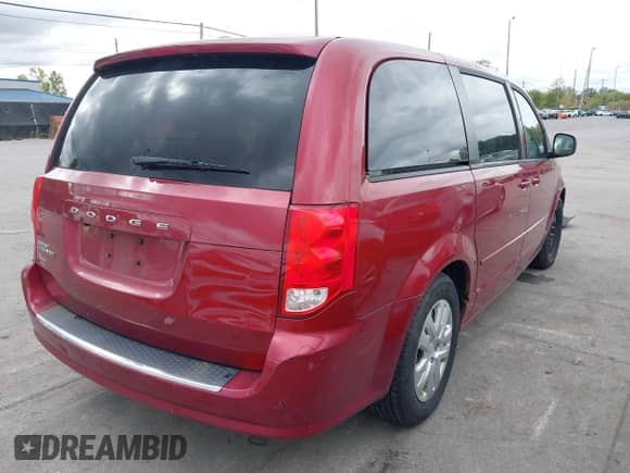 2015 Dodge Grand Caravan SE Plus with VIN 2C4RDGBG1FR569520, listed as a IAAI auction lot 43461575 with 174,476 mi miles and . Bid and sale history available at DreamBid. Image 4.