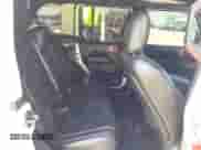 2021 Jeep Wrangler Unlimited Rubicon with VIN 1C4HJXFN0MW648257, listed as a IAAI auction lot 42594545 with 49,410 mi miles and . Bid and sale history available at DreamBid. Image 8.