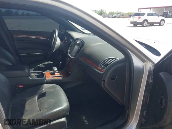 2013 Chrysler 300 with VIN 2C3CCAAG9DH727908, listed as a IAAI auction lot 42702399 with 105,987 mi miles and . Bid and sale history available at DreamBid. Image 5.