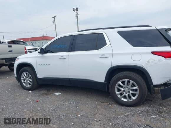 2021 Chevrolet Traverse LT z VIN 1GNERHKW4MJ233642, wystawiony jako IAAI lot #43240454 z przebiegiem 55 052 mil mil oraz . Historia ofert i sprzedaży dostępna na DreamBid. Obrazek 14.