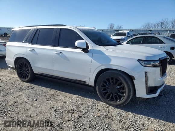 2022 Cadillac Escalade Premium Luxury с VIN 1GYS4CKL9NR154953, выставлен на аукционе Copart как лот 83537254 с пробегом 77 397 миль миль и Списание • Salvage title. История ставок и продаж доступна на DreamBid. Изображение 4.