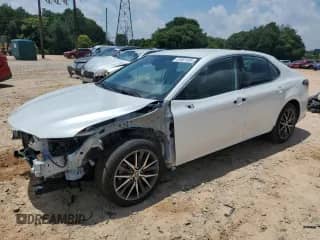 2021 Toyota Camry Hybrid XLE with VIN 4T1F31AK9MU557250, listed as a Copart auction lot 61501405 with 129,909 mi miles and Salvage title. Bid and sale history available at DreamBid. Image 1.