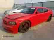 2007 Dodge Charger SRT-8 с VIN 2B3LA73W37H669857, выставлен на аукционе Copart как лот 57144425 с пробегом 169 933 миль миль и Чистый • Clean title. История ставок и продаж доступна на DreamBid. Изображение 1.