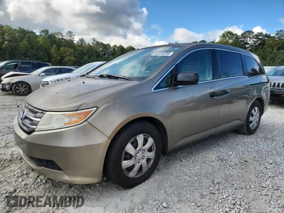 2013 Honda Odyssey LX z VIN 5FNRL5H21DB047448, wystawiony jako Copart lot #85334295 z przebiegiem 193 092 mil mil oraz Szkoda całkowita • Salvage title. Historia ofert i sprzedaży dostępna na DreamBid. Obrazek 1.