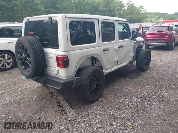 2024 Jeep Wrangler Sahara with VIN 1C4RJXP61RW193907, listed as a IAAI auction lot 42591776 with 11,874 mi miles and . Bid and sale history available at DreamBid. Image 4.