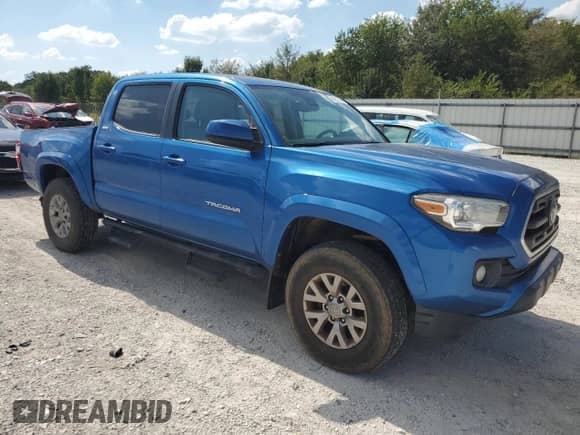 2018 Toyota Tacoma SR5 с VIN 5TFAZ5CN7JX065614, выставлен на аукционе Copart как лот 84872725 с пробегом 127 334 миль миль и Списание • Salvage title. История ставок и продаж доступна на DreamBid. Изображение 4.