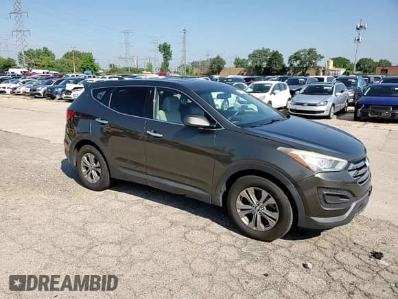 2014 Hyundai Santa Fe z VIN 5XYZTDLB6EG144284, wystawiony jako Copart lot #68639175 z przebiegiem 165 602 mil mil oraz Szkoda całkowita • Salvage title. Historia ofert i sprzedaży dostępna na DreamBid. Obrazek 14.