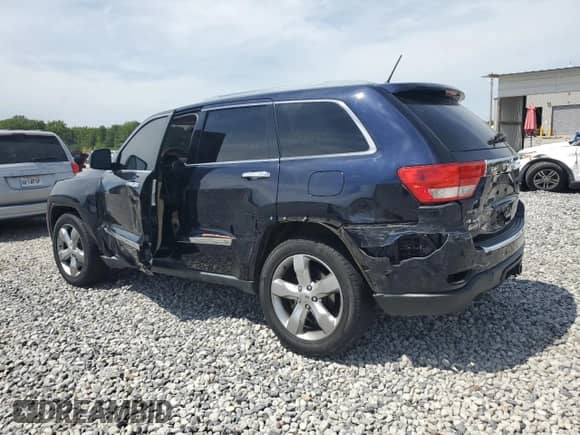 2011 Jeep Grand Cherokee Overland with VIN 1J4RR6GTXBC605039, listed as a Copart auction lot 70852225 with 122,245 mi miles and Salvage title. Bid and sale history available at DreamBid. Image 2.