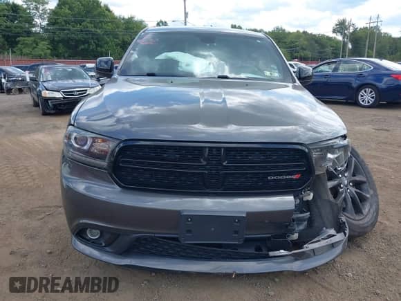 2019 Dodge Durango SXT with VIN 1C4RDJAG2KC599580, listed as a IAAI auction lot 43104403 with 108,136 mi miles and . Bid and sale history available at DreamBid. Image 12.