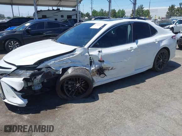 2022 Toyota Camry Hybrid XSE с VIN 4T1K31AK4NU039885, выставлен на аукционе IAAI как лот 42701525 с пробегом 31 018 миль миль и . История ставок и продаж доступна на DreamBid. Изображение 17.