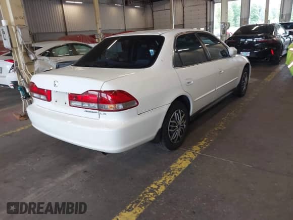 2001 Honda Accord LX with VIN JHMCG56471C029171, listed as a IAAI auction lot 43013226 with 217,224 mi miles and . Bid and sale history available at DreamBid. Image 4.