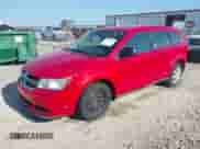 2013 Dodge Journey SE with VIN 3C4PDCAB4DT675542, listed as a IAAI auction lot 42393737 with 134,051 mi miles and . Bid and sale history available at DreamBid. Image 2.