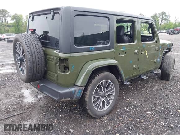 2023 Jeep Wrangler Sahara with VIN 1C4JJXP64PW684210, listed as a IAAI auction lot 42244388 with 23,622 mi miles and . Bid and sale history available at DreamBid. Image 4.