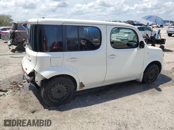 2013 Nissan Cube S with VIN JN8AZ2KR1DT305095, listed as a Copart auction lot 54222995 with 154,517 mi miles and Salvage title. Bid and sale history available at DreamBid. Image 3.