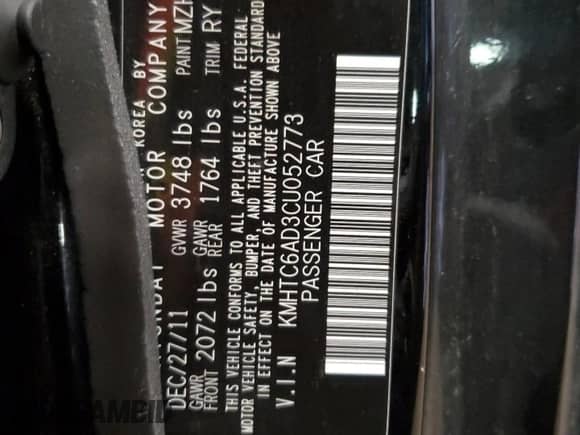 2012 Hyundai Veloster w/Gray Int z VIN KMHTC6AD3CU052773, wystawiony jako Copart lot #70096015 z przebiegiem 154 233 mil mil oraz Czysty tytuł • Clean title. Historia ofert i sprzedaży dostępna na DreamBid. Obrazek 12.