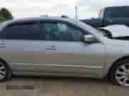 2007 Honda Accord EX-L with VIN 1HGCM66847A098621, listed as a IAAI auction lot 43050618 with 235,619 mi miles and . Bid and sale history available at DreamBid. Image 14.