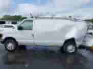 2006 Ford Econoline Cargo with VIN 1FTNE24L66HA99392, listed as a IAAI auction lot 43269341 with 166,979 mi miles and . Bid and sale history available at DreamBid. Image 14.