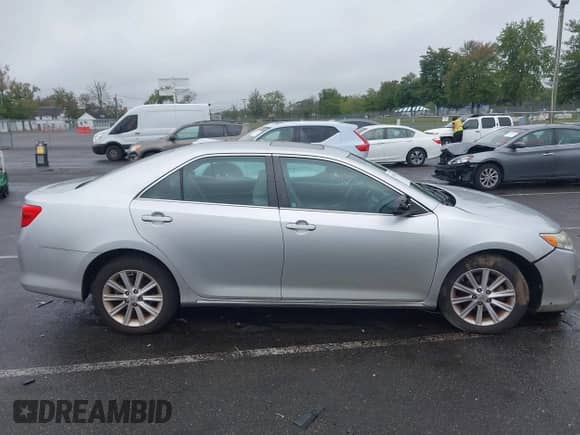 2013 Toyota Camry XLE with VIN 4T1BK1FK2DU527436, listed as a IAAI auction lot 43310672 with 158,921 mi miles and . Bid and sale history available at DreamBid. Image 13.