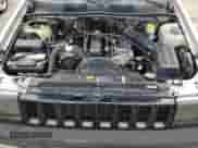 1995 Jeep Grand Cherokee Laredo with VIN 1J4GZ58S2SC703196, listed as a Copart auction lot 68571944 with 264,876 mi miles and Clean title. Bid and sale history available at DreamBid. Image 12.