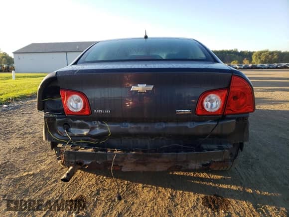 2010 Chevrolet Malibu 1FL z VIN 1G1ZA5E05AF216069, wystawiony jako Copart lot #85259505 z przebiegiem 81 320 mil mil oraz Szkoda całkowita • Salvage title. Historia ofert i sprzedaży dostępna na DreamBid. Obrazek 6.