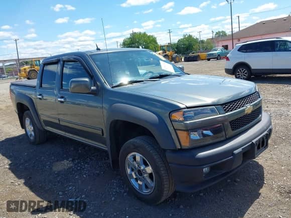 2011 Chevrolet Colorado 1LT z VIN 1GCHTCFE5B8113848, wystawiony jako IAAI lot #42781184 z przebiegiem 64 485 mil mil oraz . Historia ofert i sprzedaży dostępna na DreamBid. Obrazek 1.