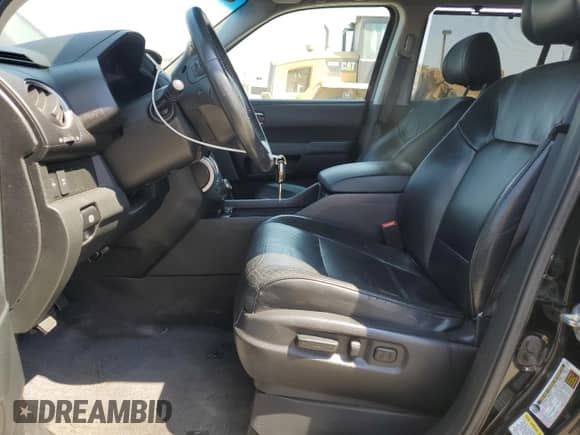 2011 Honda Pilot Touring with VIN 5FNYF3H9XBB041665, listed as a Copart auction lot 70728095 with 198,665 mi miles and Salvage title. Bid and sale history available at DreamBid. Image 7.