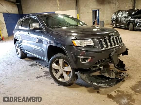 2015 Jeep Grand Cherokee Overland с VIN 1C4RJFCT0FC943798, выставлен на аукционе Copart как лот 66320745 с пробегом 187 178 миль миль и Списание • Salvage title. История ставок и продаж доступна на DreamBid. Изображение 14.