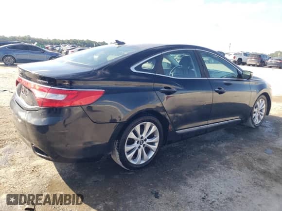 2014 Hyundai Azera Limited с VIN KMHFH4JG0EA385935, выставлен на аукционе Copart как лот 86805355 с пробегом 86 145 миль миль и Списание • Salvage title. История ставок и продаж доступна на DreamBid. Изображение 3.