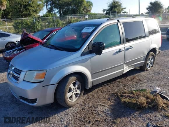 2010 Dodge Grand Caravan SXT with VIN 2D4RN5D11AR251628, listed as a IAAI auction lot 43350917 with 109,808 mi miles and . Bid and sale history available at DreamBid. Image 2.