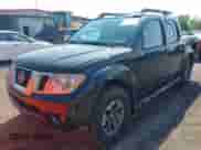 2016 Nissan Frontier S z VIN 1N6AD0EVXGN705086, wystawiony jako IAAI lot #42425274 z przebiegiem 110 614 mil mil oraz . Historia ofert i sprzedaży dostępna na DreamBid. Obrazek 2.