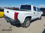 2024 Toyota Tacoma SR with VIN 3TYKD5HN9RT002032, listed as a IAAI auction lot 41640216 with 6,144 mi miles and . Bid and sale history available at DreamBid. Image 4.