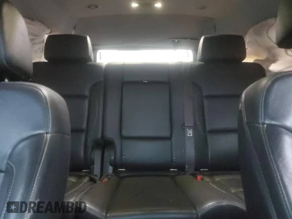 2015 Chevrolet Tahoe LT с VIN 1GNSKBKC5FR688899, выставлен на аукционе Copart как лот 81311665 с пробегом 165 706 миль миль и Списание • Salvage title. История ставок и продаж доступна на DreamBid. Изображение 10.