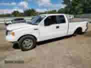 2007 Ford F-150 STX with VIN 1FTRX12W57FA37403, listed as a Copart auction lot 84213265 with 2,342,455 mi miles and Salvage title. Bid and sale history available at DreamBid. Image 1.