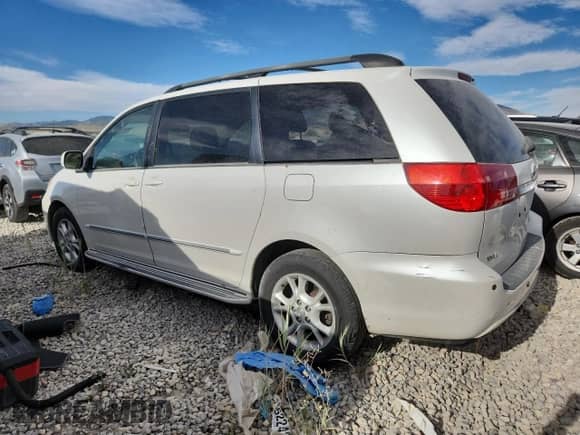 2004 Toyota Sienna XLE z VIN 5TDBA22CX4S001118, wystawiony jako Copart lot #65920175 z przebiegiem 251 232 mil mil oraz Szkoda całkowita • Salvage title. Historia ofert i sprzedaży dostępna na DreamBid. Obrazek 2.